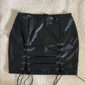 BNWOT black leather like mini skirt